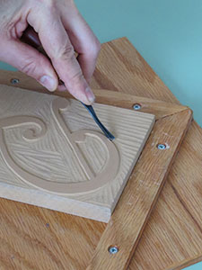 carving a linoleum block